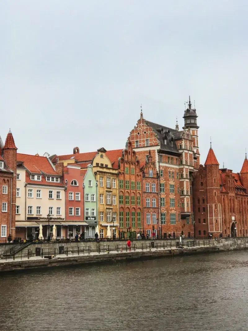 Colourful historic houses along the Motława river in Gdańsk