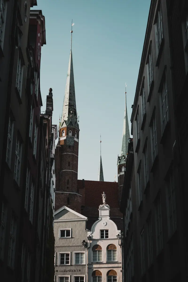 Gdańsk old town towers and spires against a clear sky